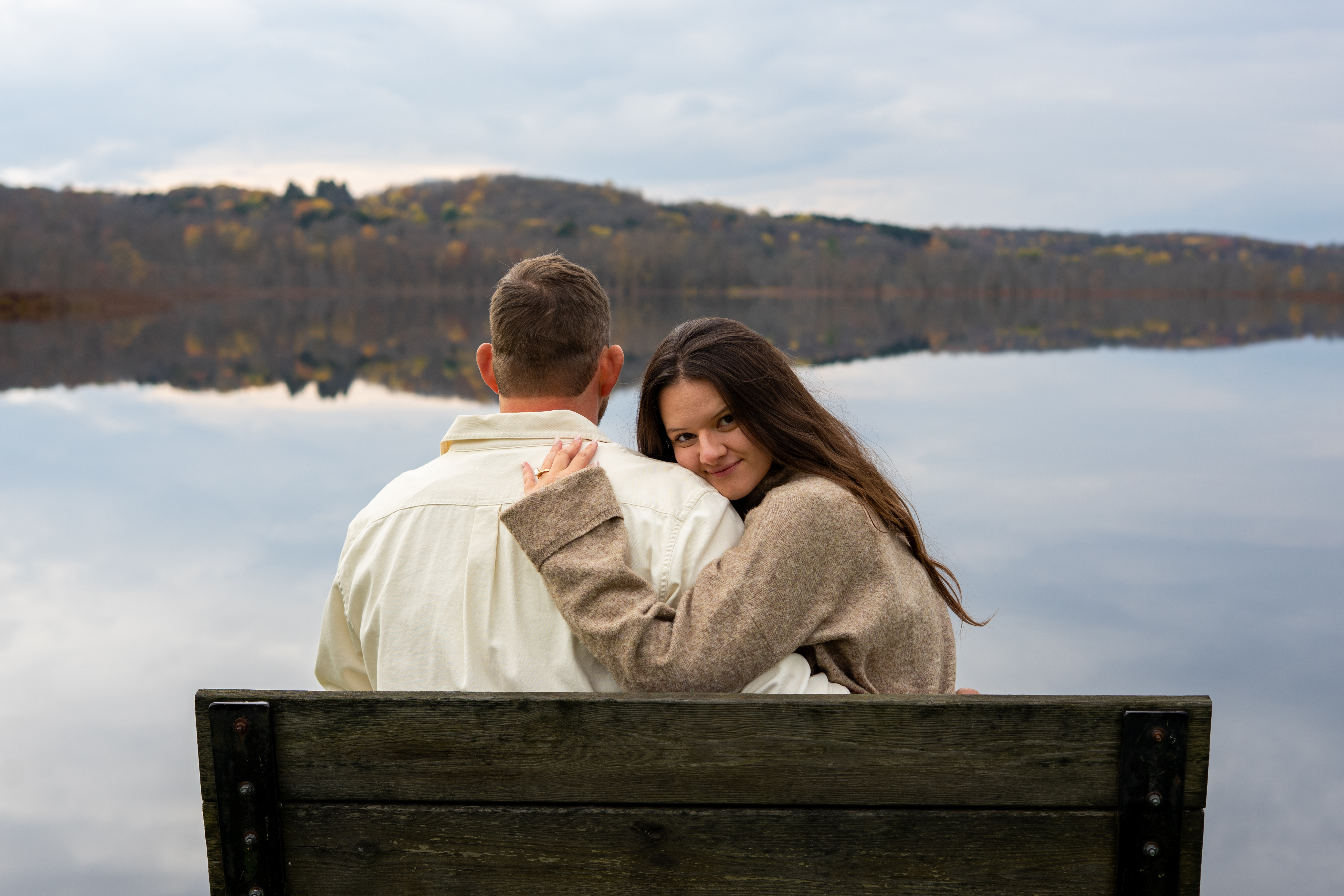 Couple on bench by lake