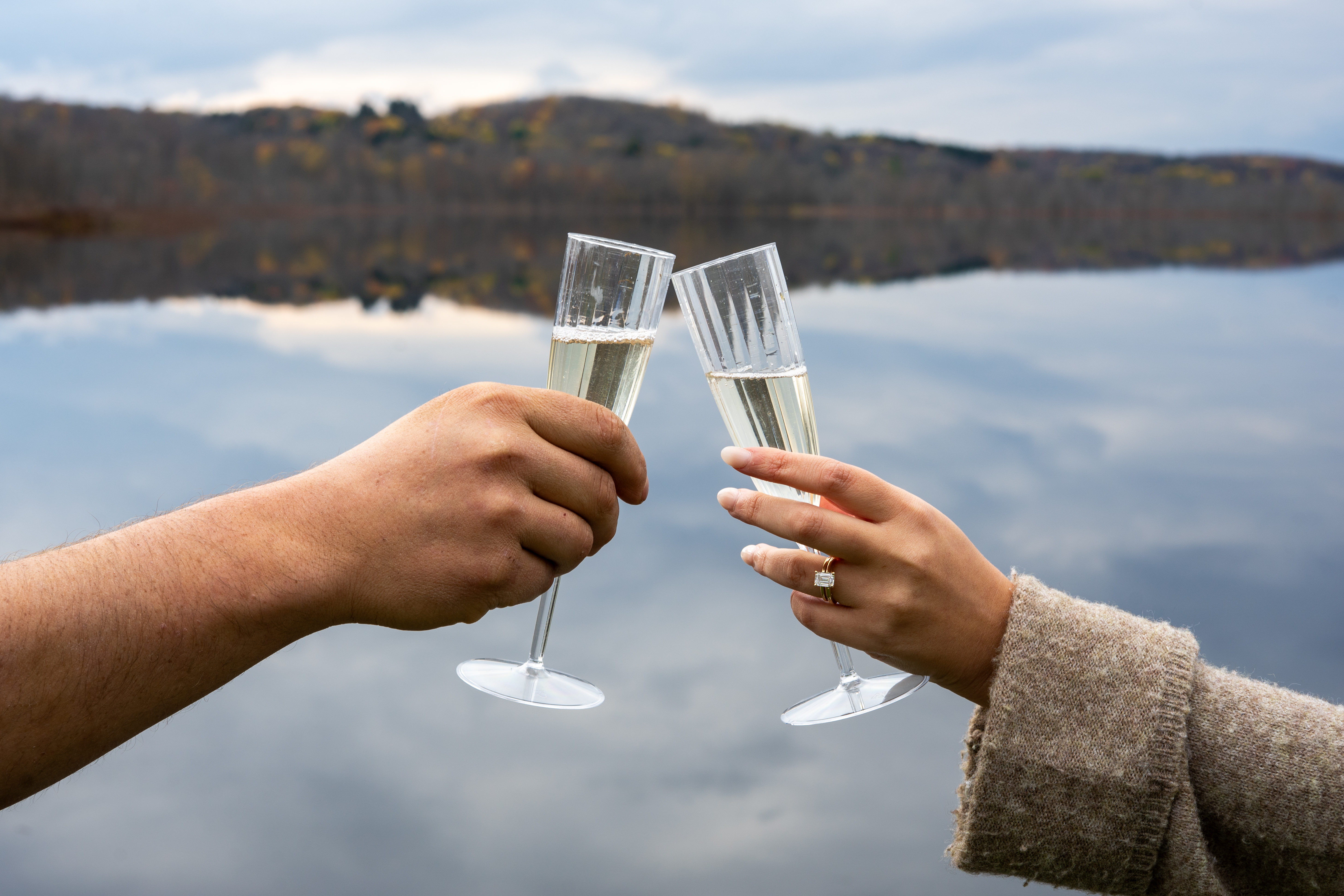 Champagne toast engagement ring