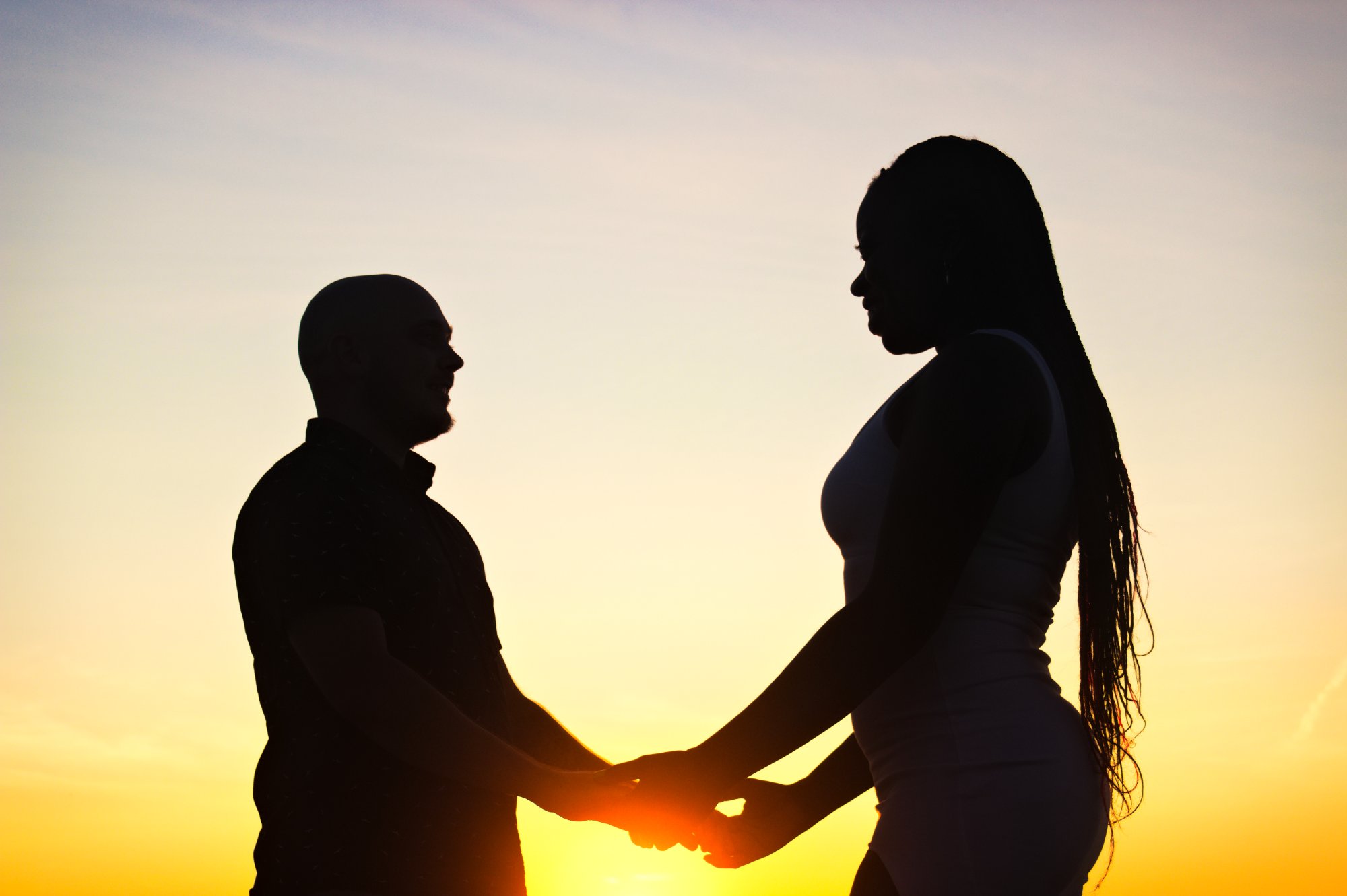 Hands holding sunset